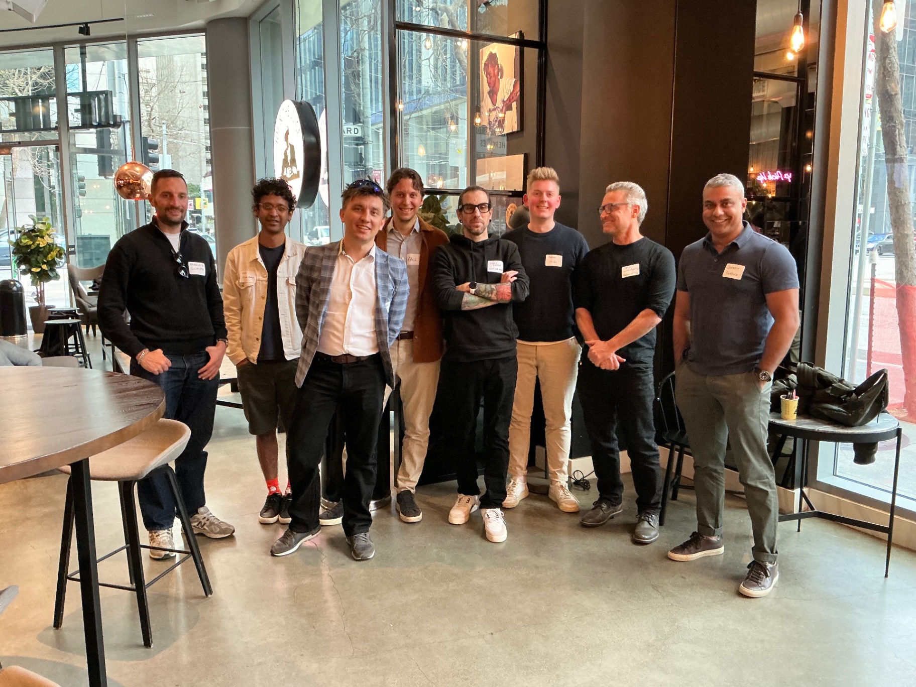 Founders lined up in front of the venue windows