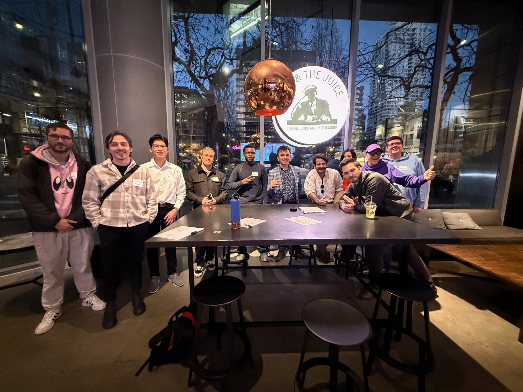 Founders around the shared table at night