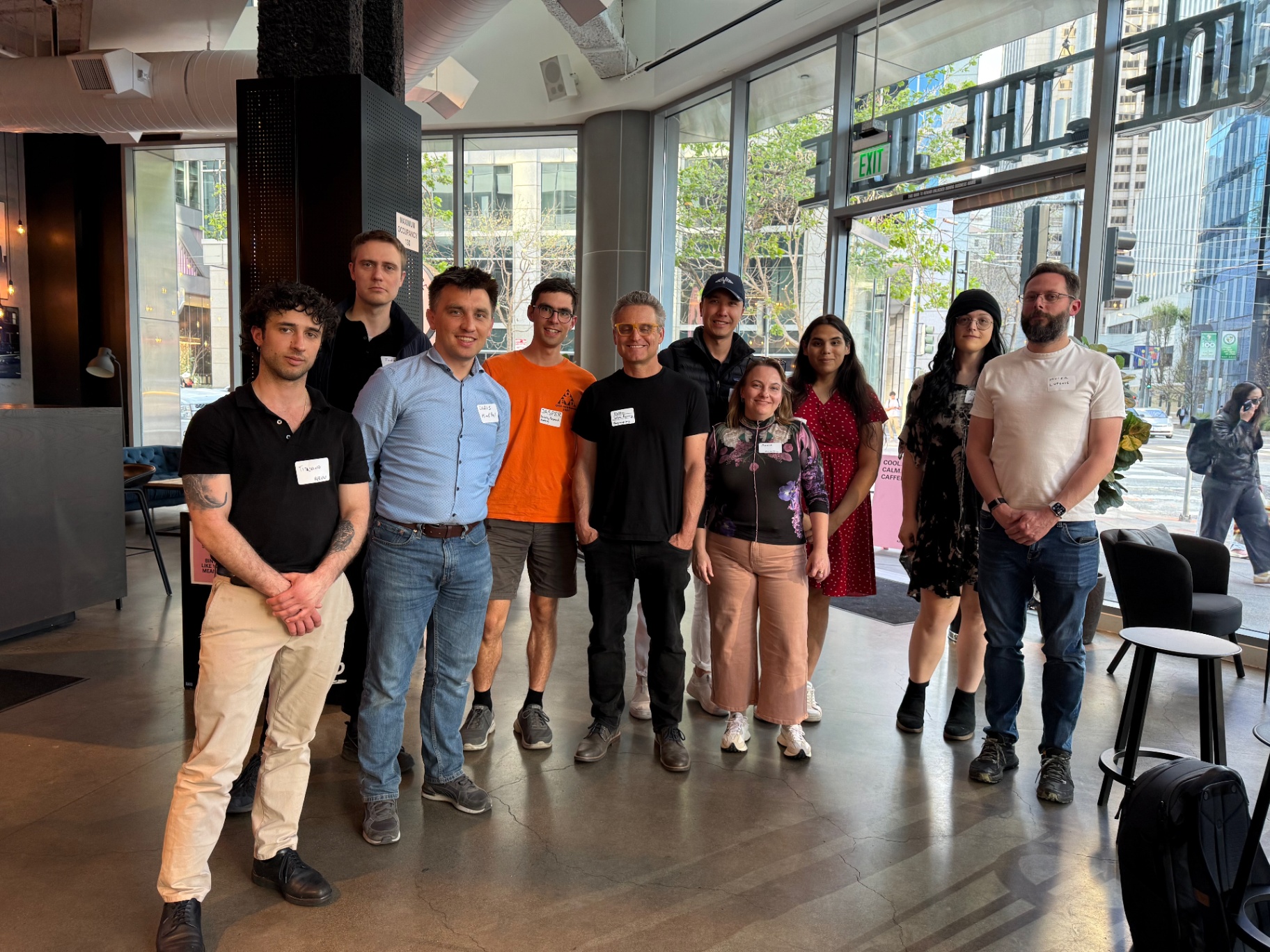 Founders posing near the venue window